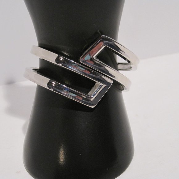 Faux Polished Silver Abstract Bangle Spring Hinge Bracelet Modern Twist Cuff - Picture 2 of 15